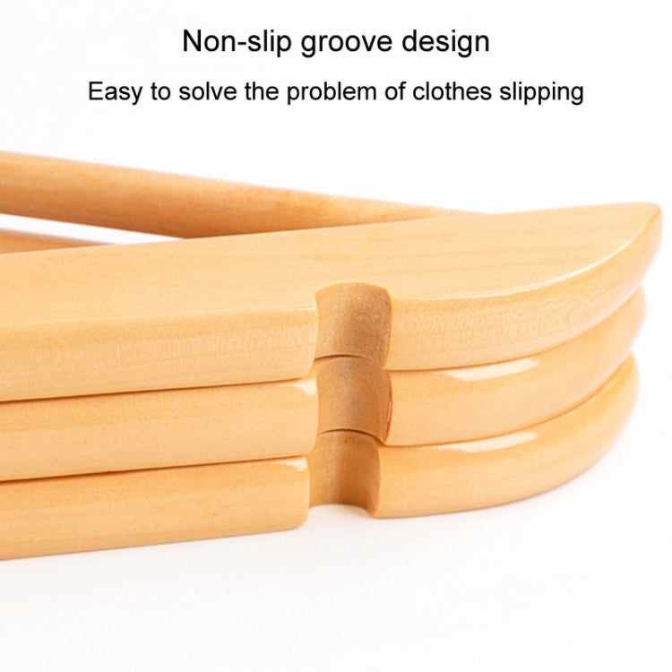 Grooved non-slip wooden hanger arms with rounded shoulder notch.