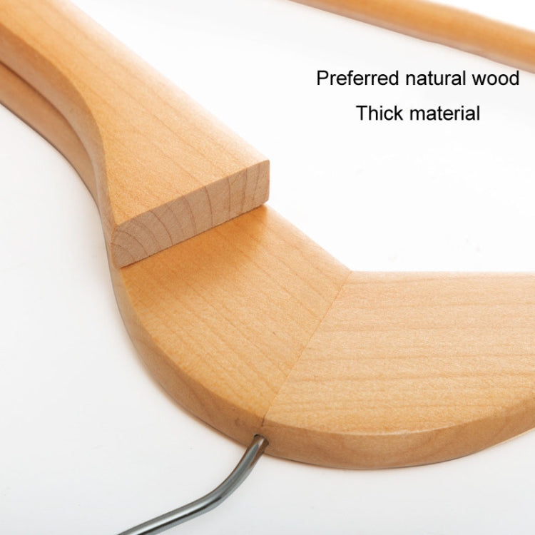 Thick solid wood hanger with curved shoulder and smooth rounded edges.