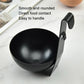 Black egg poaching mould with hanging handle, rounded cup for poached eggs.