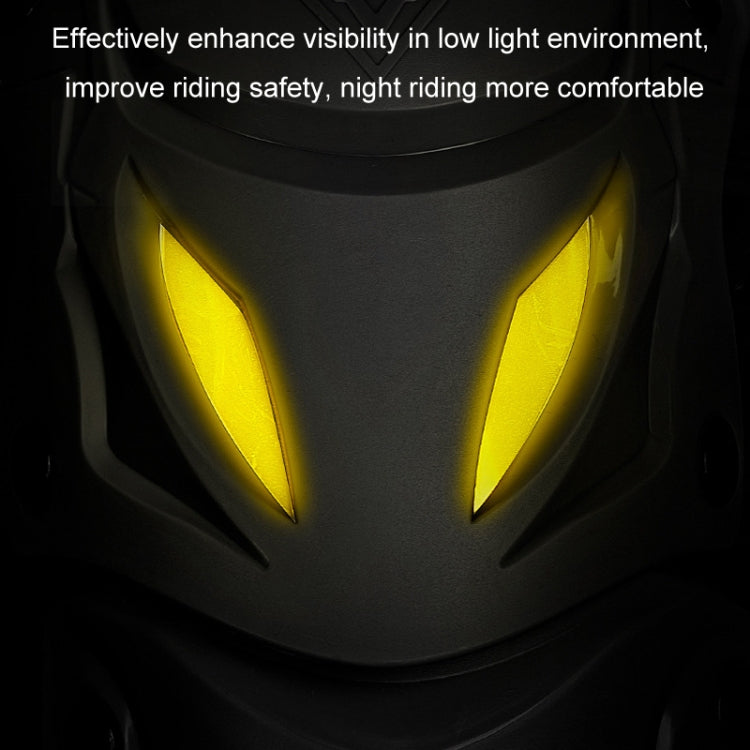 Yellow reflective-style vents on dark motorcycle protective pad shell