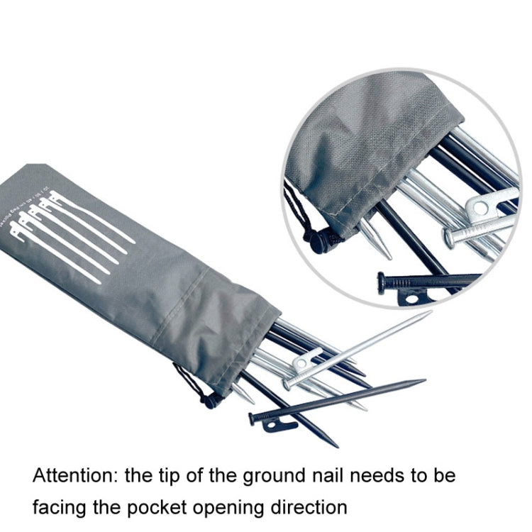 Gray ground spike storage bag with drawstring opening and metal stakes inside