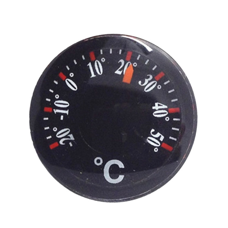 Round black plastic thermometer dial with °C scale and colored indicator marks