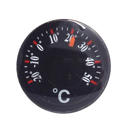 Round black plastic thermometer dial with °C scale and colored indicator marks