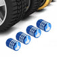 Blue tire valve caps with knurled texture and white hand logo icons near a tire