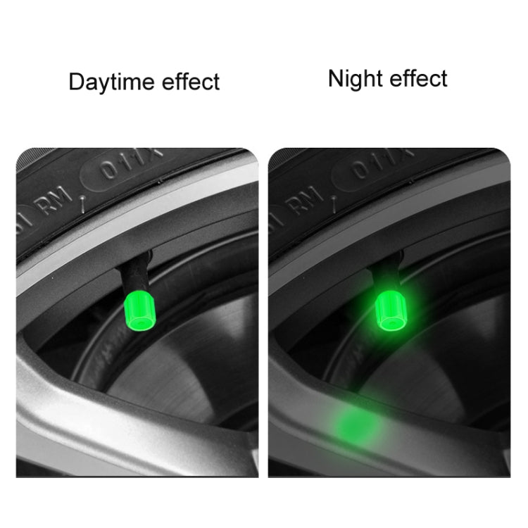 Green luminous tire valve cap glowing on a car tire valve stem