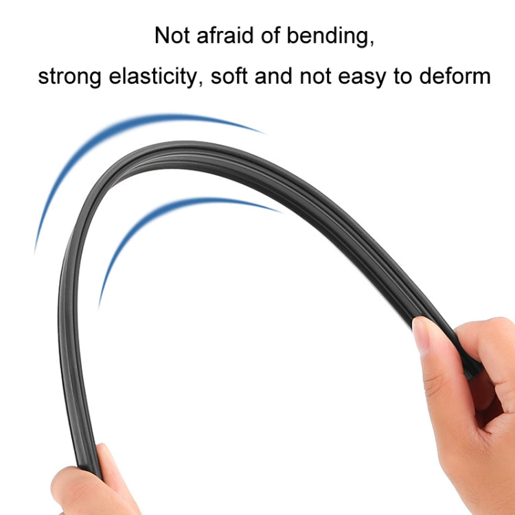 Flexible black rubber car side window wiper strip, held and bent by hand