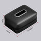 Car seat armrest tissue box holder, black; top oval slot and textured zipper border