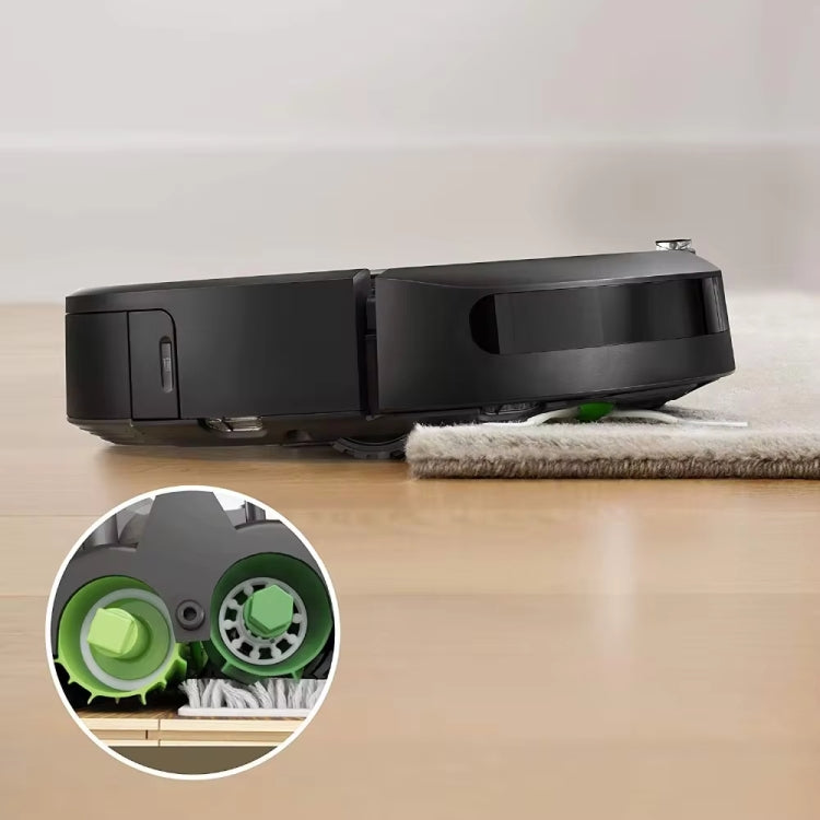 Robot vacuum with rotating green side brushes and visible dust pickup roller