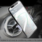 Car air vent phone mount holding a smartphone with navigation map screen