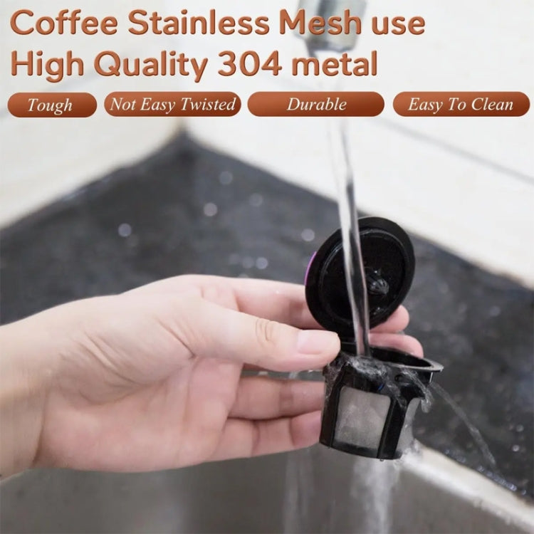 Black reusable mesh coffee filter being rinsed, with handle tab