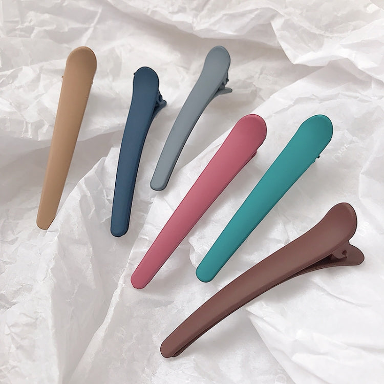 5-piece duckbill bangs clip set in mixed colors with curved tips.