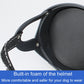 Black pet helmet with side chin strap attachment and smooth outer shell