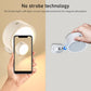 White rotating LED magnetic spotlight being attached, with soft glowing ring