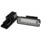 LED license plate light with ribbed black mount and clear white LED lens