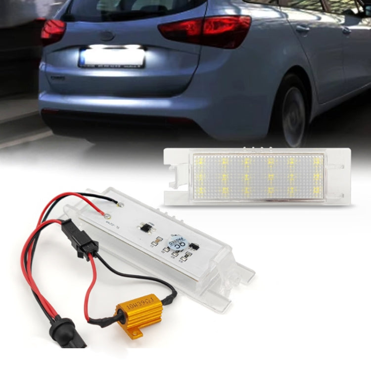 LED license plate light set with white LED panel, clear housing, wiring harness