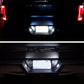 Glowing LED license plate lights on rear pickup license plate area