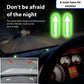 Glowing green up-arrow car stickers on dashboard area for night driving guidance