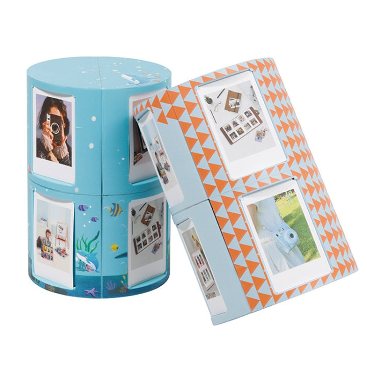 Blue round photo rack with hinged panels and three picture frames