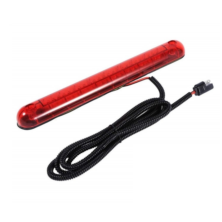 Red LED brake light bar with attached black cable harness
