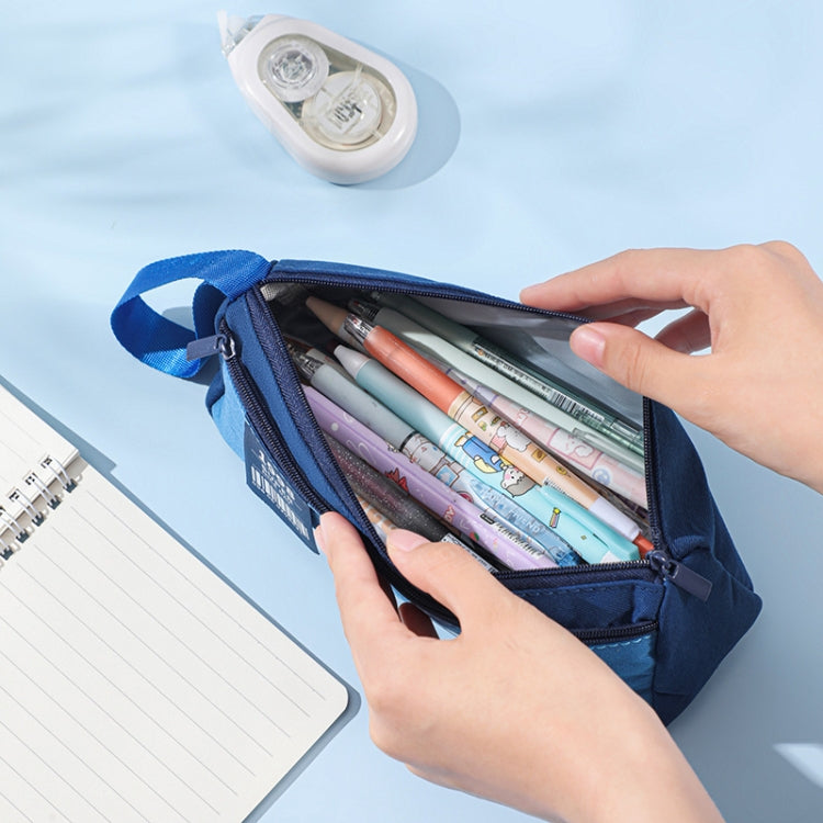Blue double-layer pencil case open, showing colorful pencils inside.
