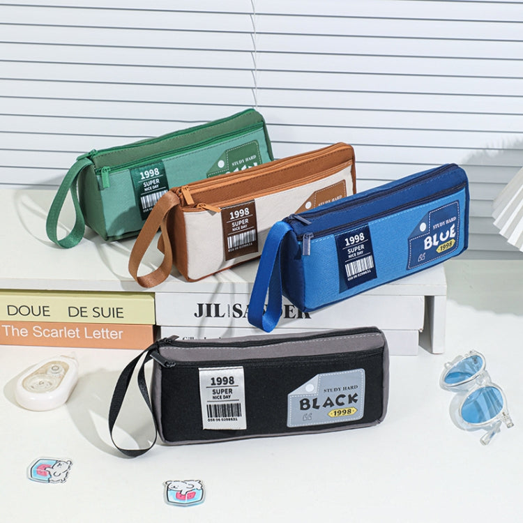 Assorted colors double-layer pencil cases with wrist straps on display.