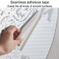 Manual cleaning scraper with integrated adhesive tape for mounting on smooth surfaces
