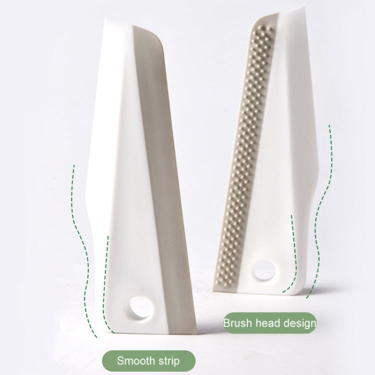 Set of manual cleaning scraper pieces with perforated brush strip and smooth strip