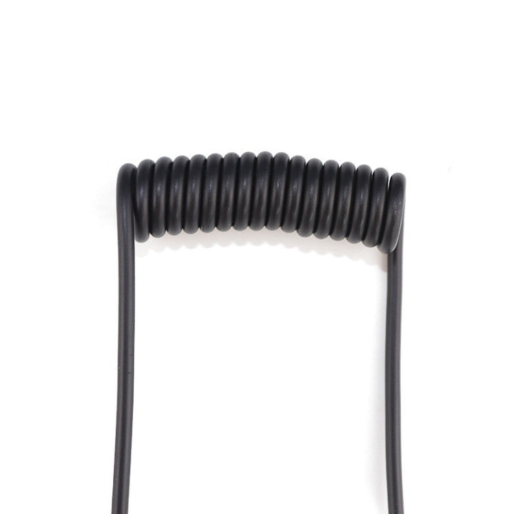 Black spring-wrapped section of 3.5mm stereo audio cable