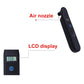Digital tire pressure gauge showing LCD display and air nozzle tip, dark body