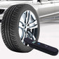 Tire pressure gauge placed by car tire with LCD display, dark body
