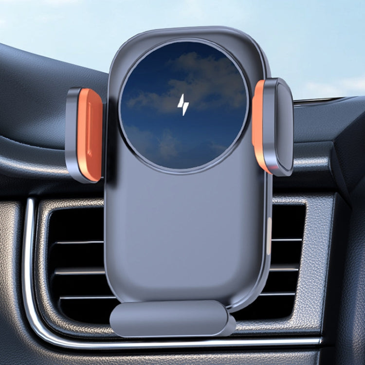 Car wireless phone charger holder mounted on air vent with phone cradle and orange accents.