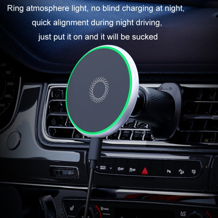 Car magnetic phone holder with glowing green ring light on an air vent
