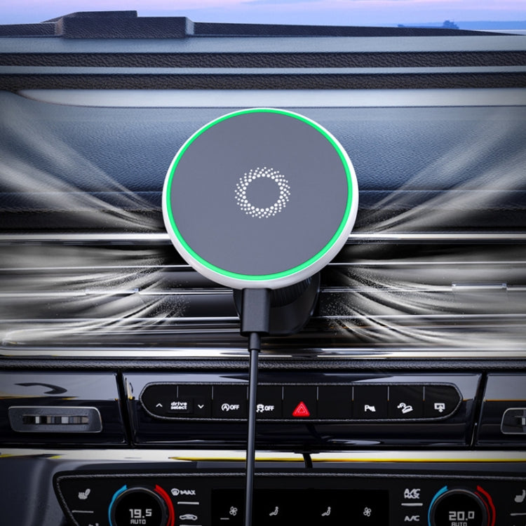 Car magnetic phone holder with green ring light mounted on dashboard air vents