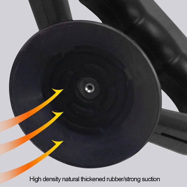Black suction cup on car dent puller with thick rubber texture