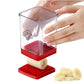 Fruit and vegetable slicer with clear container, red base, and push plate held by hands