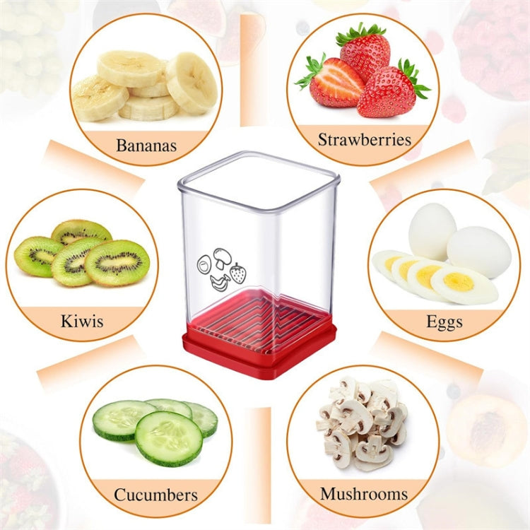 Fruit and vegetable slicer with clear container and red base, shown with sliced ingredients