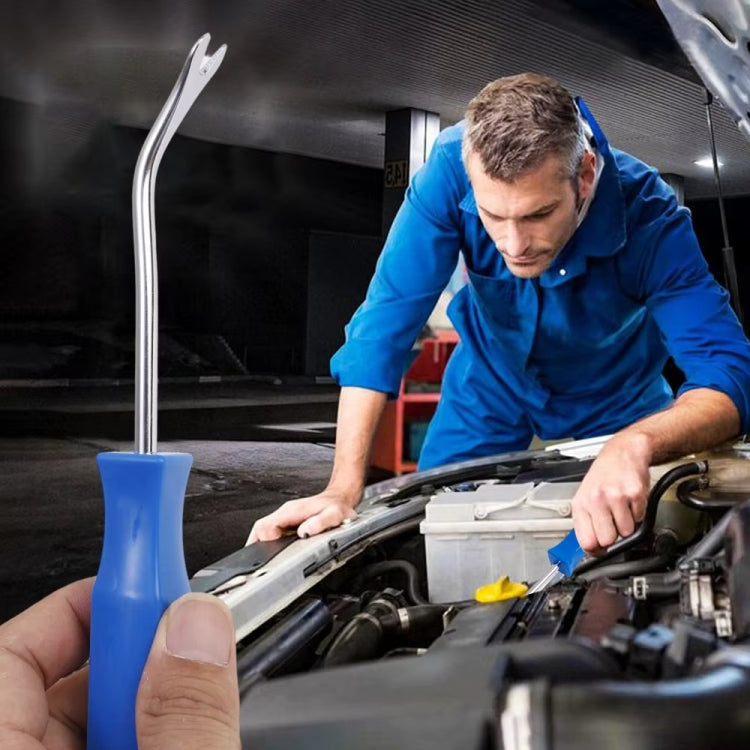 Car door panel removal tool held by blue handle while working on vehicle