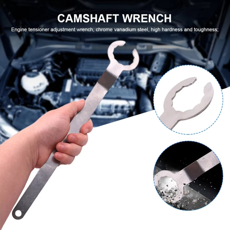 Silver engine tensioner adjustment wrench held by hand with forked open end