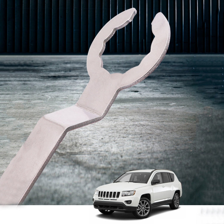 Silver engine tensioner wrench with U-shaped fork opening and long straight handle
