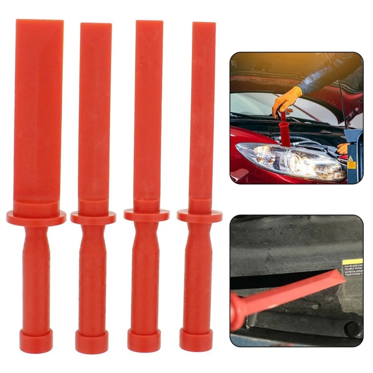 Four red tire scraper pieces with flat tips and open rings at the handle end