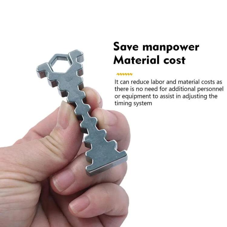 Camshaft timing tool held in hand, silver toothed profile with hex opening end