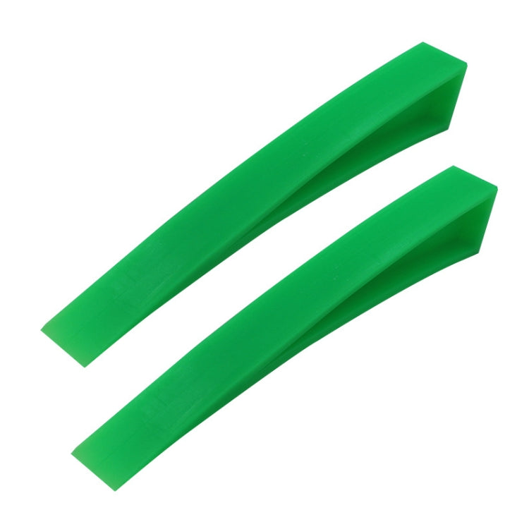 Green plastic car dent repair support clip, long wedge-shaped tool
