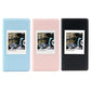 Square photo album in blue, pink, and black with front photo frames