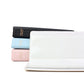 Photo album set with stacked covers in black, blue, and pink