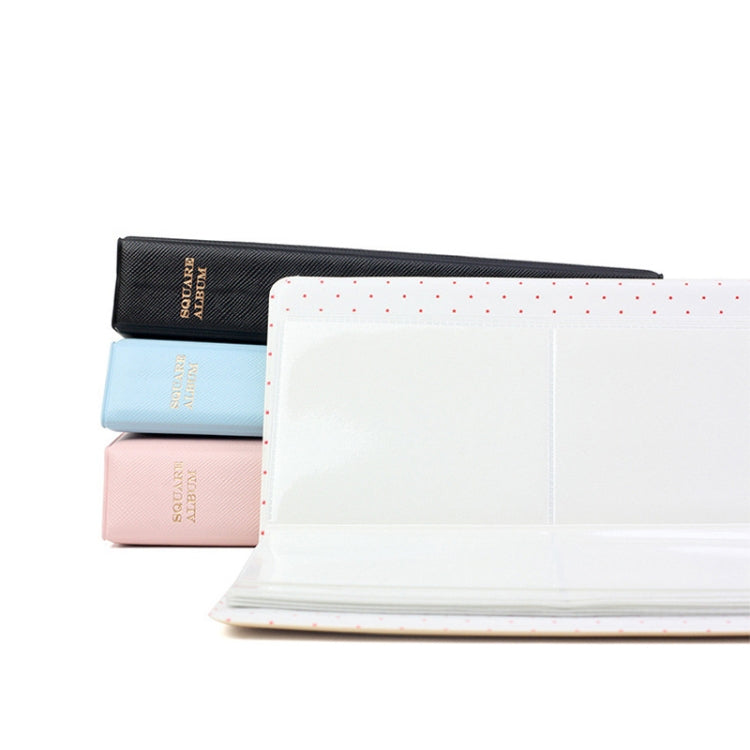 Photo album set with stacked covers in black, blue, and pink