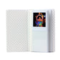 Open white photo album page with red dotted pattern and a square print
