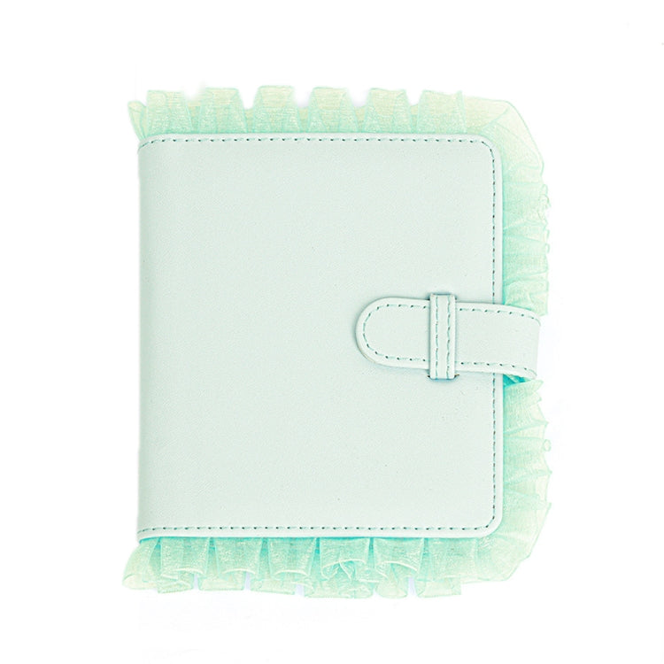 Green lace photo storage album with front clasp and ruffled border