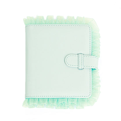 Green lace photo storage album with front clasp and ruffled border