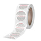 Round self-adhesive warning label sticker roll with loose labels and red WARNING text