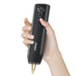 Handheld spot welding machine in use, fingers on control buttons